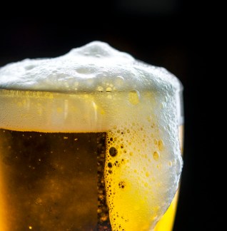 A glass of cold beer macro photography